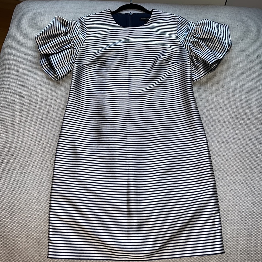 Structured, flutter sleeve dress. Silver and navy blue.